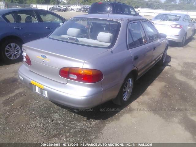 1Y1SK5488XZ410983 - 1999 CHEVROLET GEO PRIZM LSI SILVER photo 4