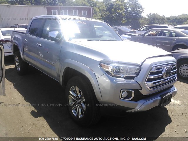 3TMGZ5AN3JM133118 - 2018 TOYOTA TACOMA DOUBLE CAB/LTD SILVER photo 1