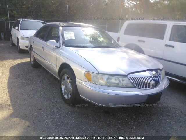 1LNFM97V9WY643263 - 1998 LINCOLN CONTINENTAL  SILVER photo 1