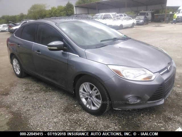 1FAHP3H2XCL185088 - 2012 FORD FOCUS SEL GRAY photo 1