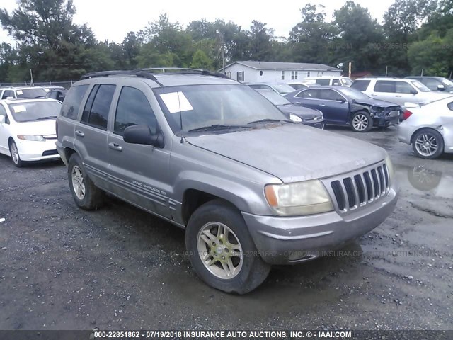 1J4G268S4XC530038 - 1999 JEEP GRAND CHEROKEE LIMITED SILVER photo 1