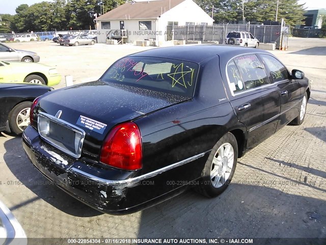 1LNHM84WX7Y621595 - 2007 LINCOLN TOWN CAR EXECUTIVE L BLACK photo 4