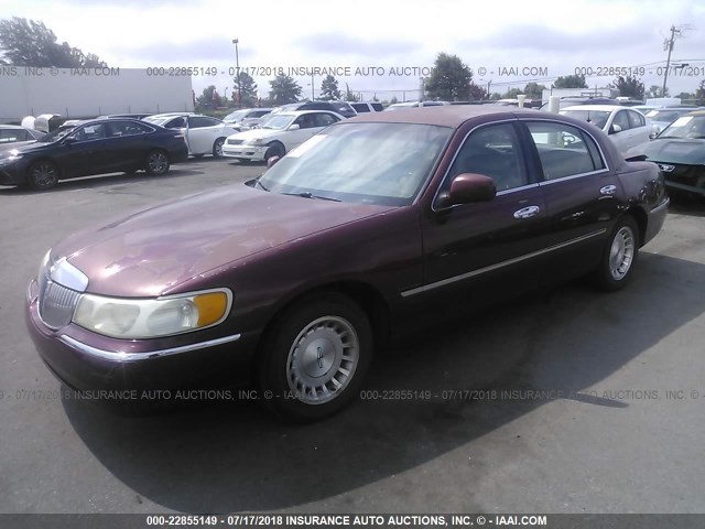 1LNHM81W3XY709859 - 1999 LINCOLN TOWN CAR EXECUTIVE BURGUNDY photo 2