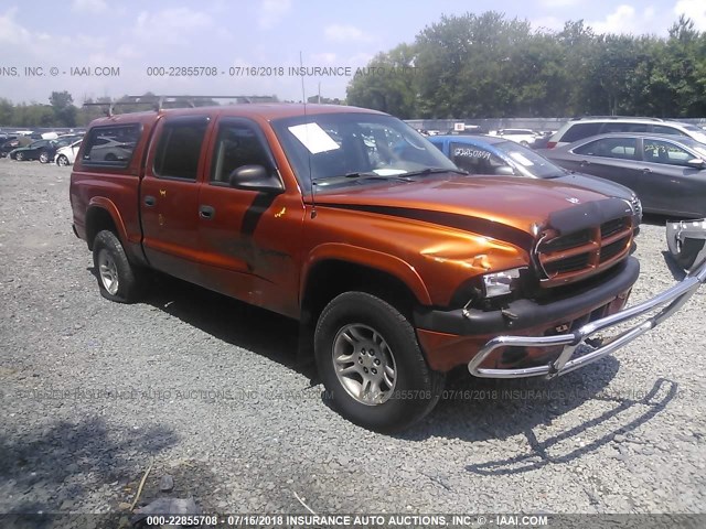 1B7GG2AN81S136575 - 2001 DODGE DAKOTA QUAD ORANGE photo 1