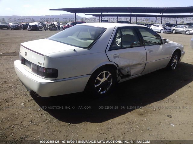 1G6KY529XVU808188 - 1997 CADILLAC SEVILLE STS WHITE photo 4