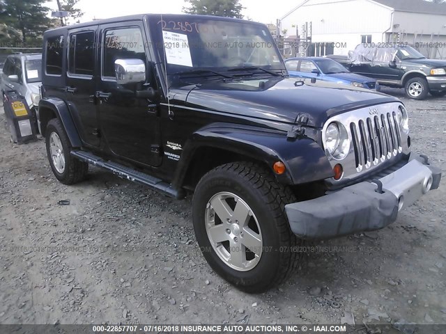 1J4GA59139L728907 - 2009 JEEP WRANGLER UNLIMITE SAHARA BLACK photo 1