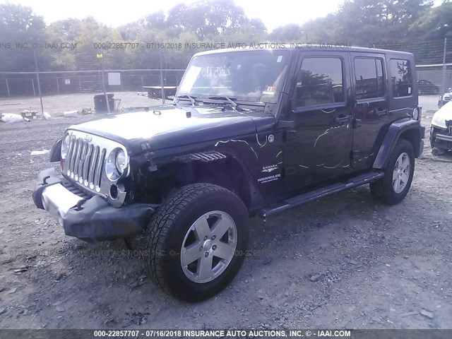 1J4GA59139L728907 - 2009 JEEP WRANGLER UNLIMITE SAHARA BLACK photo 2