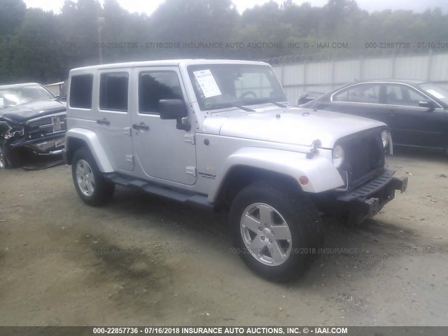 1J4BA5H18BL557265 - 2011 JEEP WRANGLER UNLIMITE SAHARA SILVER photo 1