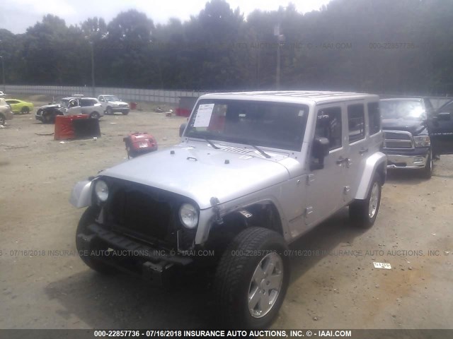 1J4BA5H18BL557265 - 2011 JEEP WRANGLER UNLIMITE SAHARA SILVER photo 6