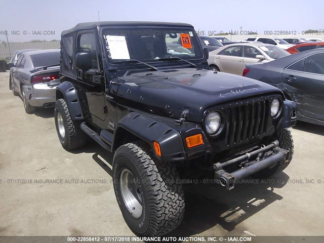 1J4FA49S34P774544 - 2004 JEEP WRANGLER / TJ SPORT BLACK photo 1