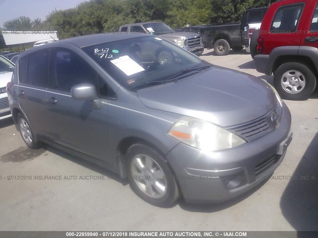 3N1BC13E19L357980 - 2009 NISSAN VERSA S/SL GRAY photo 1