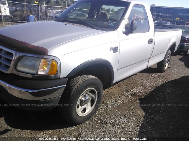 1FTRF18W3XNA96465 - 1999 FORD F150 SILVER photo 2