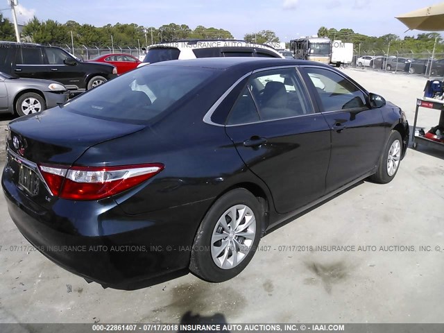 4T4BF1FKXFR510297 - 2015 TOYOTA CAMRY LE/XLE/SE/XSE 黑色 照片 4