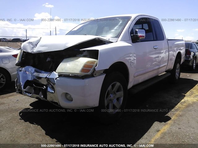 1N6AA06B94N541581 - 2004 NISSAN TITAN XE/SE/LE WHITE photo 2