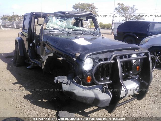 1J4GA59139L729734 - 2009 JEEP WRANGLER UNLIMITE SAHARA BLACK photo 1