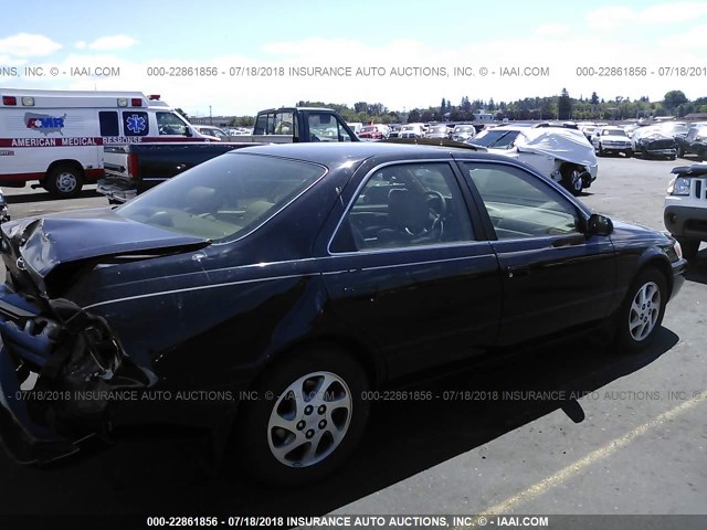 JT2BF28K3X0216386 - 1999 TOYOTA CAMRY LE/XLE Schwarz Foto 4