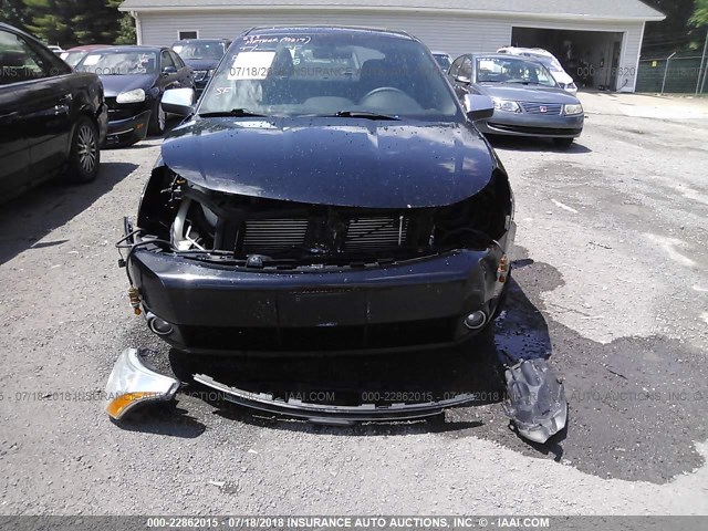 1FAHP35N38W169819 - 2008 FORD FOCUS SE/SEL/SES BLACK photo 6