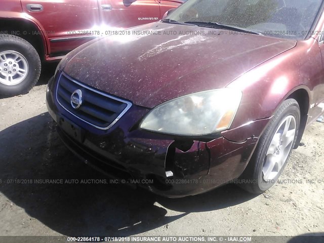 1N4AL11D72C246781 - 2002 NISSAN ALTIMA S/SL RED photo 6