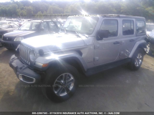 1C4HJXEG5JW153759 - 2018 JEEP WRANGLER UNLIMITE SAHARA SILVER photo 2