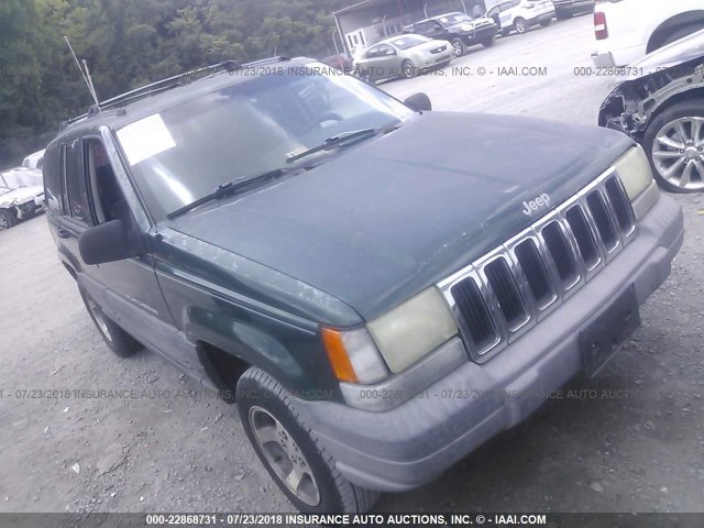 1J4GZ58S1VC606897 - 1997 JEEP GRAND CHEROKEE LAREDO/TSI GREEN photo 1