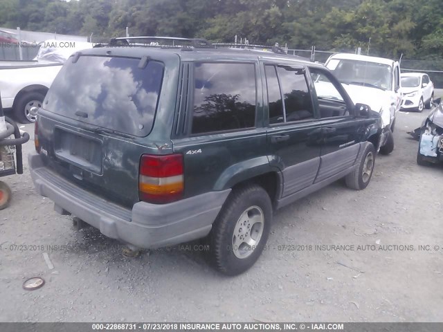 1J4GZ58S1VC606897 - 1997 JEEP GRAND CHEROKEE LAREDO/TSI GREEN photo 4