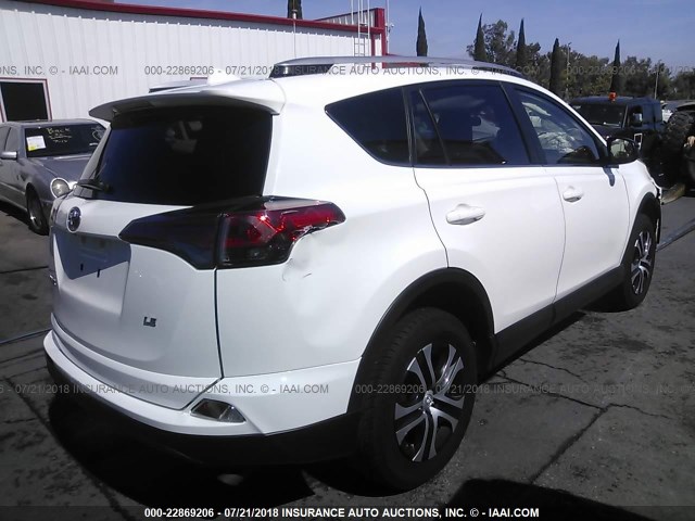 JTMZFREV9GJ099954 - 2016 TOYOTA RAV4 LE WHITE photo 4