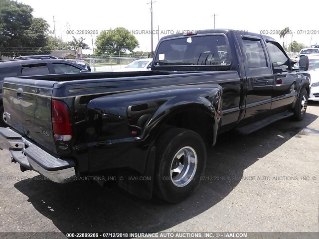 1FTWW32P33EB43729 - 2003 FORD F350 SUPER DUTY BLACK photo 4