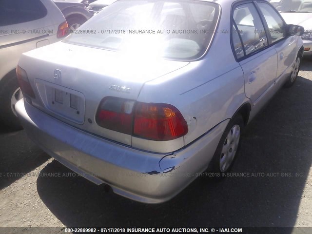 2HGEJ6618XH574441 - 1999 HONDA CIVIC SE SILVER photo 4