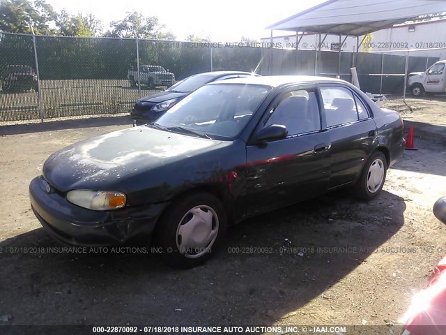 1Y1SK528X1Z430047 - 2001 CHEVROLET GEO PRIZM LSI GREEN photo 2