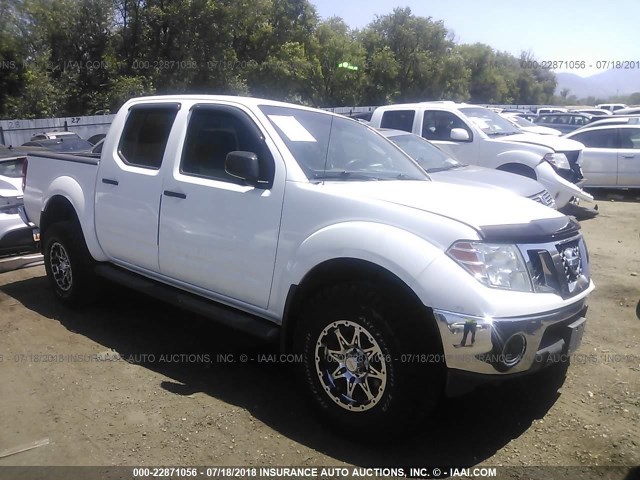 1N6AD07W89C419886 - 2009 NISSAN FRONTIER CREW CAB SE/LE/NISMO WHITE photo 1