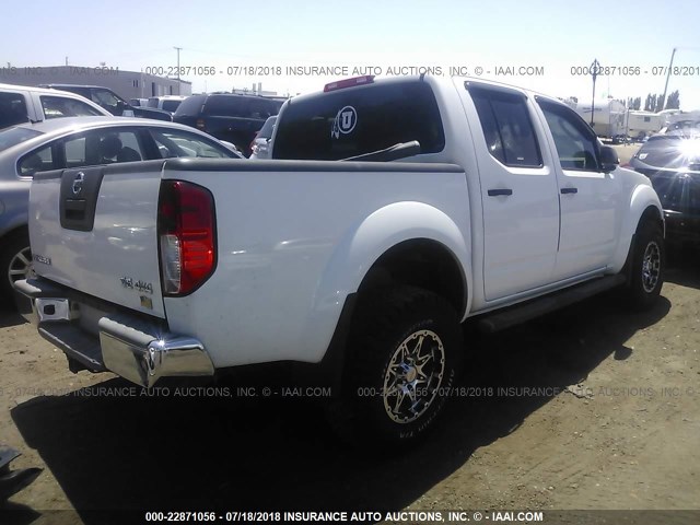 1N6AD07W89C419886 - 2009 NISSAN FRONTIER CREW CAB SE/LE/NISMO WHITE photo 4