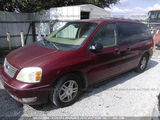 2FMZA52274BA83992 - 2004 FORD FREESTAR SEL RED photo 2