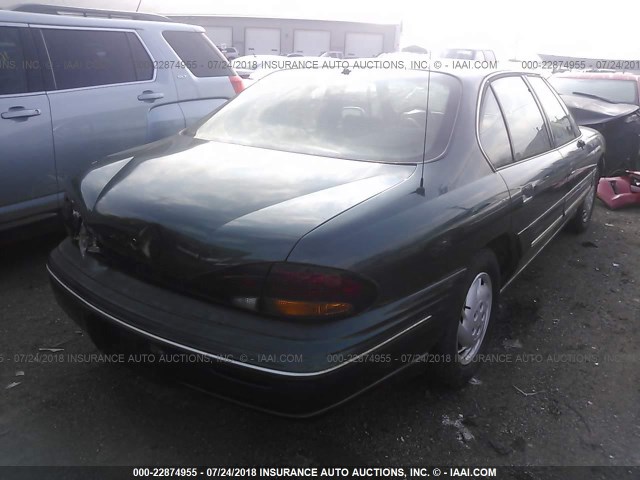 1G2HX52K6VH268901 - 1997 PONTIAC BONNEVILLE SE BLUE photo 4