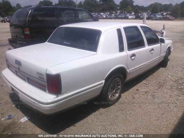 1LNLM81W8VY736370 - 1997 LINCOLN TOWN CAR EXECUTIVE Белый фото 4