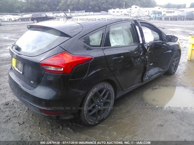 1FADP3K28GL302499 - 2016 FORD FOCUS SE BLACK photo 4