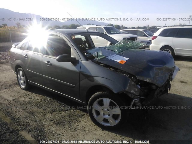 1FAHP34N47W268830 - 2007 FORD FOCUS ZX4/S/SE/SES GRAY photo 1