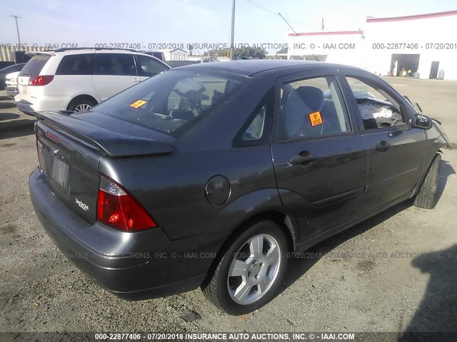1FAHP34N47W268830 - 2007 FORD FOCUS ZX4/S/SE/SES GRAY photo 4