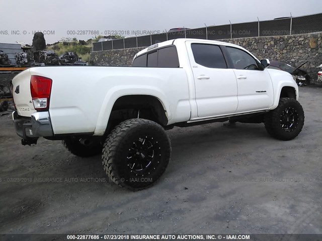 3TMDZ5BNXGM001337 - 2016 TOYOTA TACOMA DBL CAB/SR5/TRD SPORT/OR WHITE photo 4