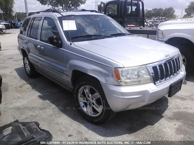 1J8GX68J54C287116 - 2004 JEEP GRAND CHEROKEE OVERLAND SILVER photo 1