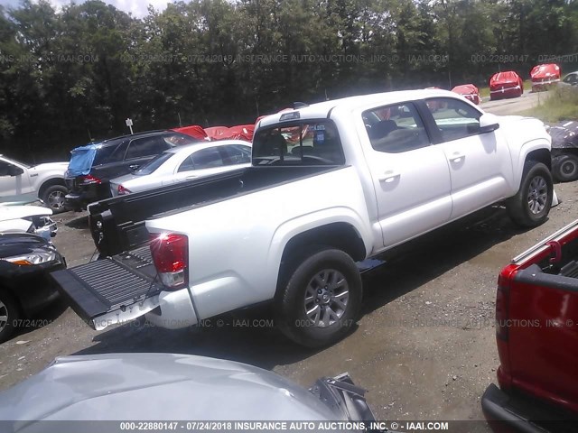 5TFAX5GN4HX092652 - 2017 TOYOTA Tacoma DOUBLE CAB/SR/SR5 WHITE photo 4