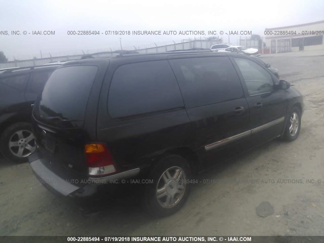 2FMZA52472BA05467 - 2002 FORD WINDSTAR SE BLACK photo 4