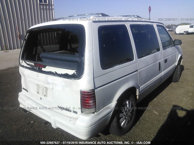 2P4GH45R7SR281093 - 1995 PLYMOUTH VOYAGER SE WHITE photo 4