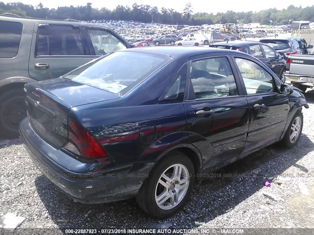 1FAFP34394W177764 - 2004 FORD FOCUS SE COMFORT/SE SPORT Dark Blue photo 4