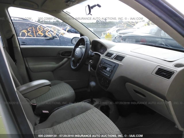 1FAFP34NX7W130782 - 2007 FORD FOCUS ZX4/S/SE/SES 棕色 照片 5