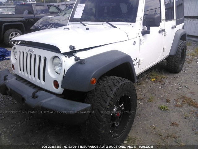 1C4BJWDG3CL244289 - 2012 JEEP WRANGLER UNLIMITE SPORT WHITE photo 2