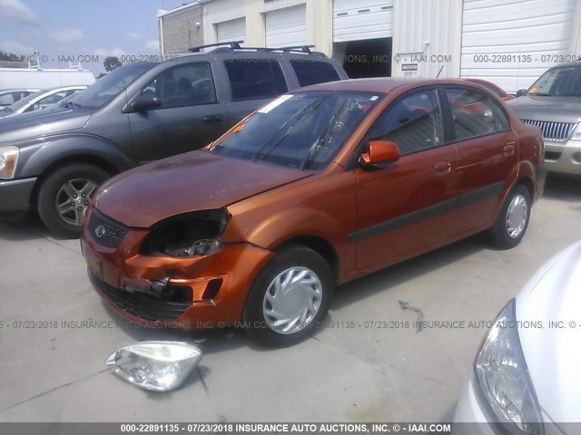 KNADE223196533374 - 2009 KIA RIO LX/SX ORANGE photo 2