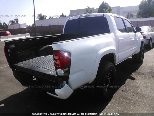3TMAZ5CN9HM046465 - 2017 TOYOTA TACOMA DBL CAB/SR5/TRD SPORT/OR WHITE photo 4
