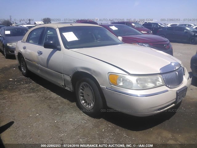 1LNHM83WXXY648488 - 1999 LINCOLN TOWN CAR CARTIER CREAM photo 1