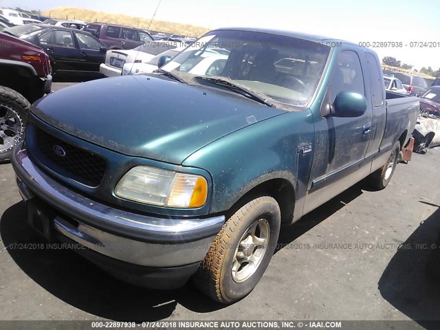 1FTDX1762VKC76981 - 1997 FORD F150 GREEN photo 2