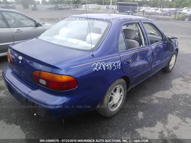 1Y1SK5280WZ412051 - 1998 CHEVROLET GEO PRIZM LSI BLUE photo 4